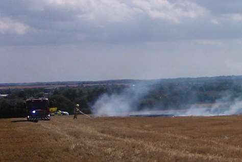 Firefighters tackle the blaze. Pictures Geoff Bew