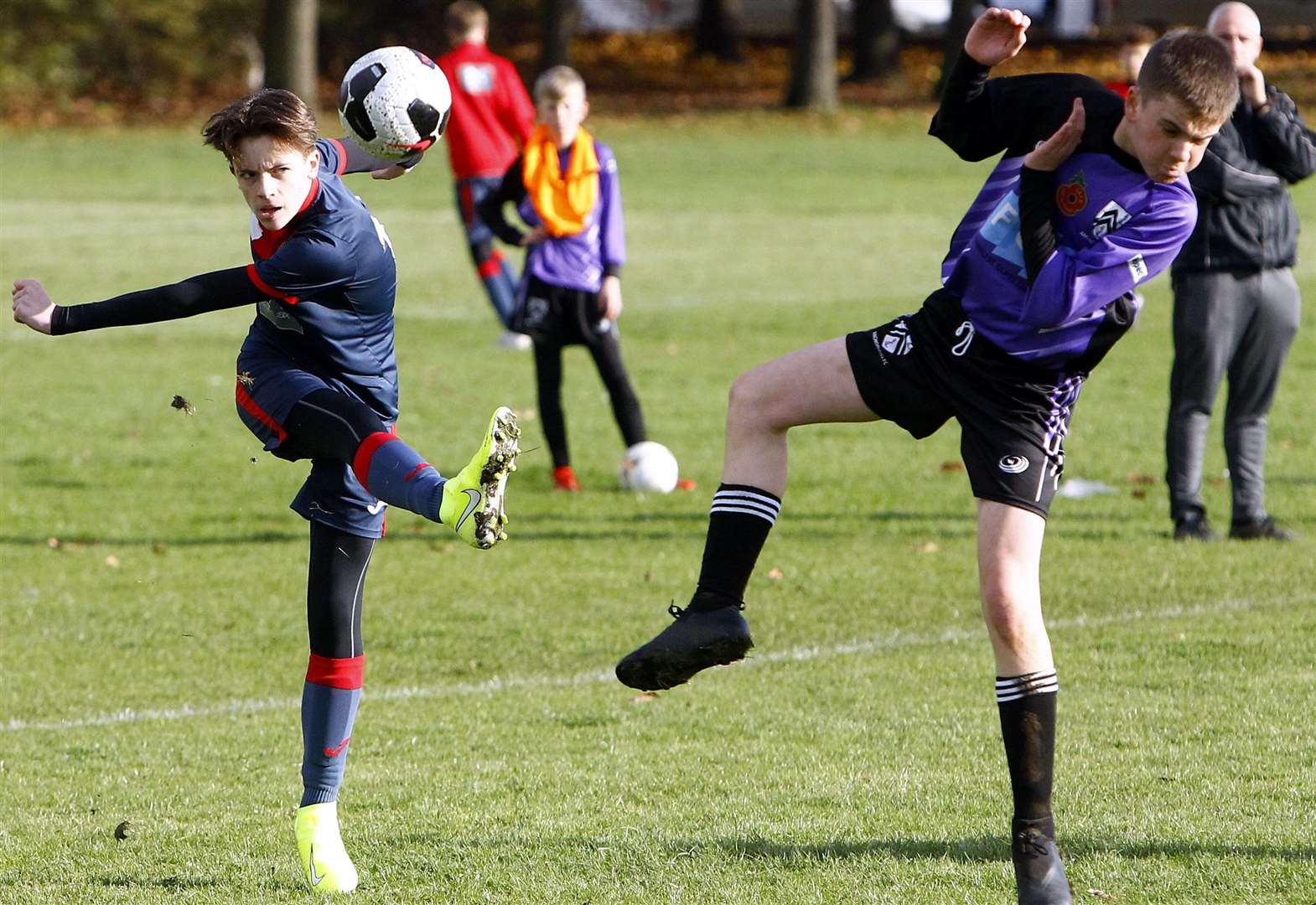 Hempstead Valley Rangers under-14s clear the ball against Anchorians United under-14s. Picture: Sean Aidan FM21304803