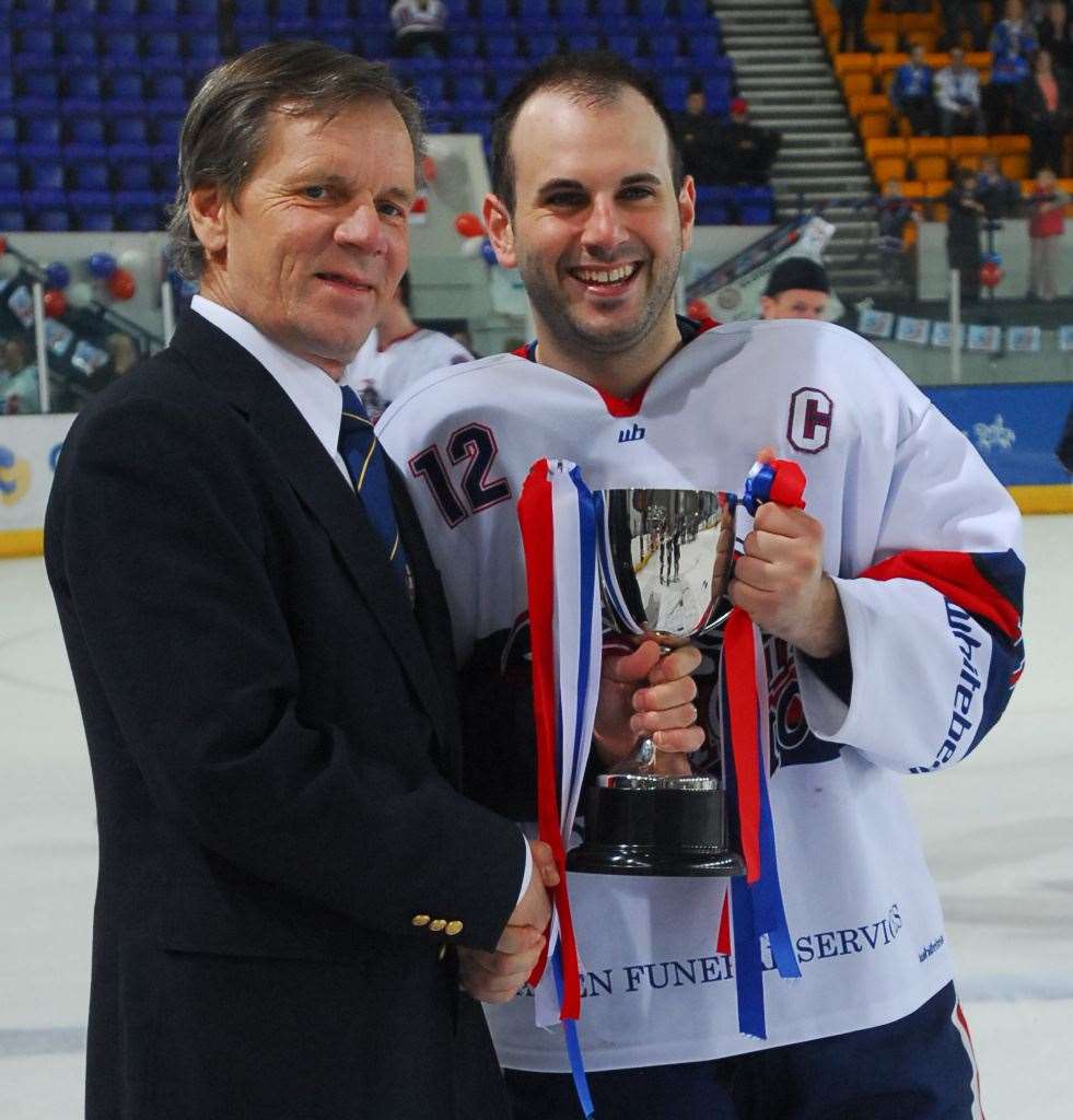 Karl Lennon receiving the English National League trophy for Invicta Dynamos from league chairman Ken Taggart in 2009. Picture: Andy Mason