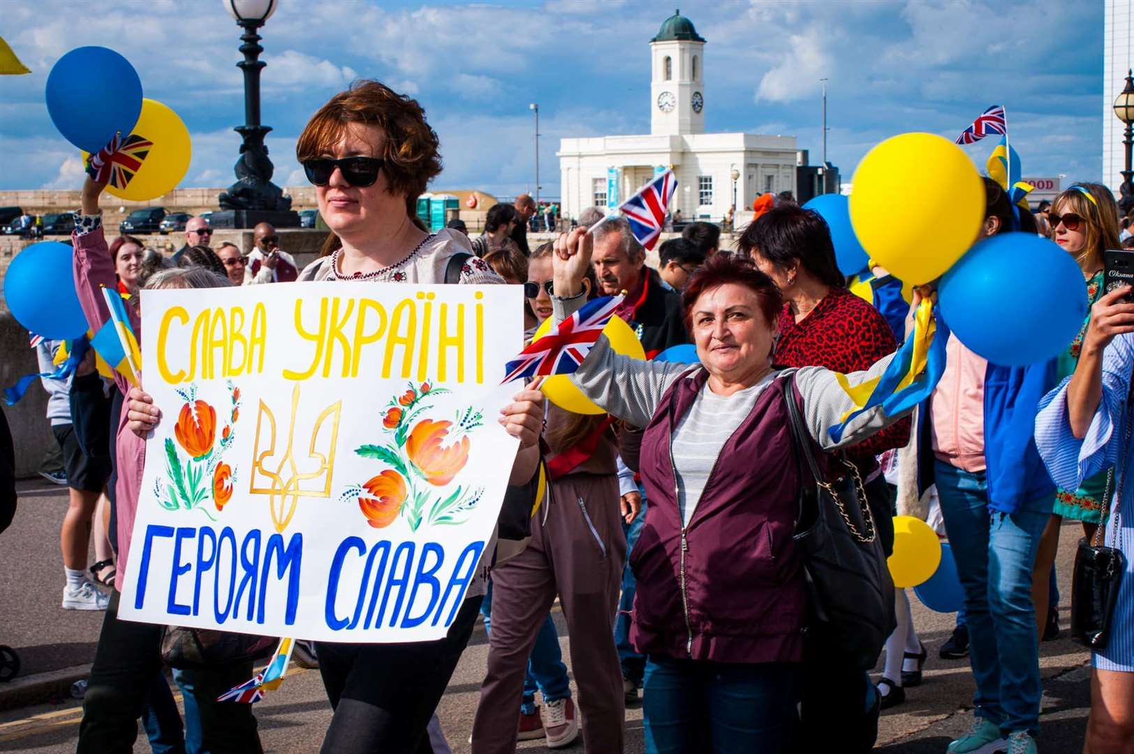 Margate Carnival 2023: People held signs and dressed in support of Ukraine. Picture: Louis Mclaren