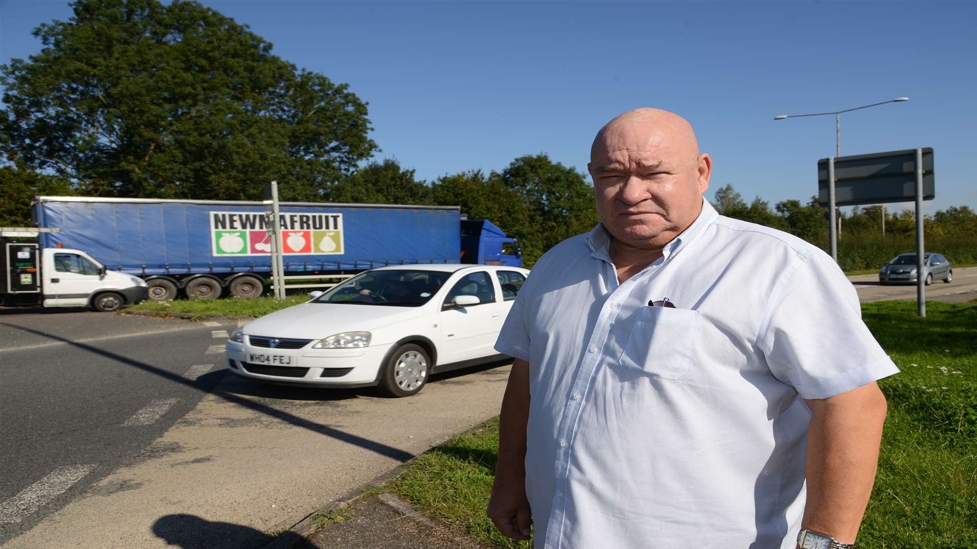 Cllr Alan Bennett by the stretch of road, near the Mercure Great Danes Hotel