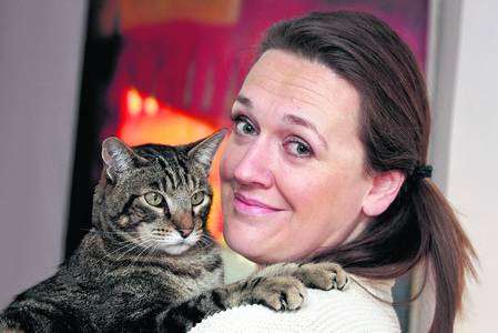 Emma Spink happy to be reunited with Buster the family cat who disappeared for five years