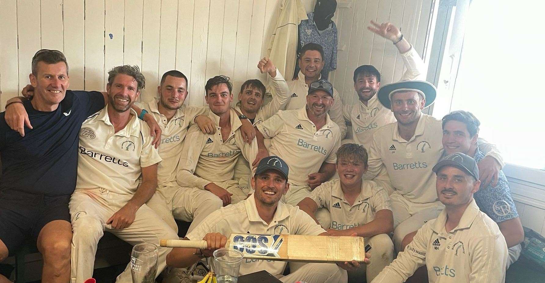 St Lawrence & Highland Court's first-team celebrate winning Kent League Division 1