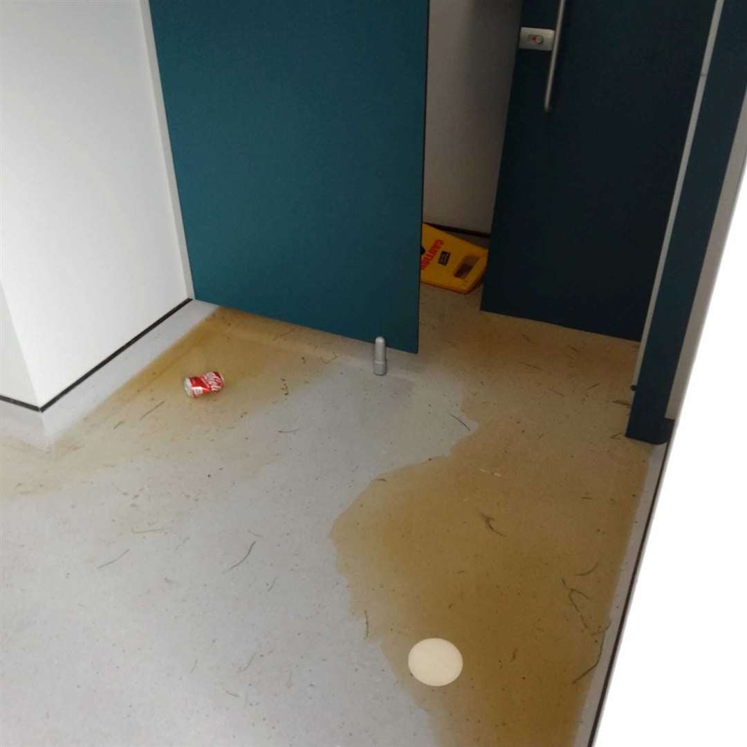 A blocked loo caused this mess in the toilets