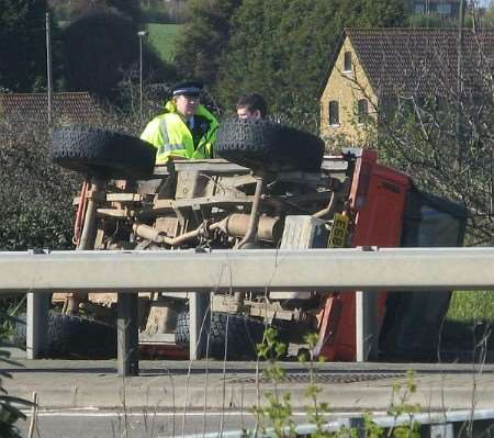 Three people were hurt after this car overturned in Vanguard Way, Strood.
