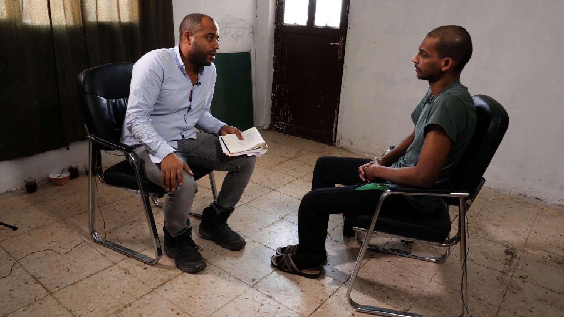 El Shafee Elsheikh (right) talking to ITV’s security editor Rohit Kachroo (ITV News/PA)