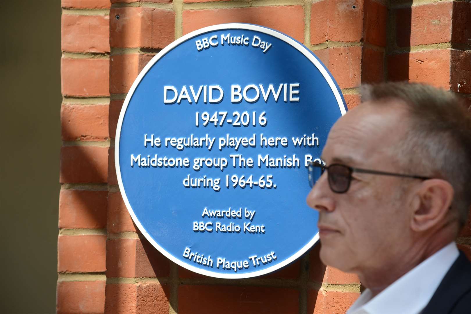 Topper Headon, former drummer with The Clash at the unveiling of the blue plaque to David Bowie in the Royal Star Arcade