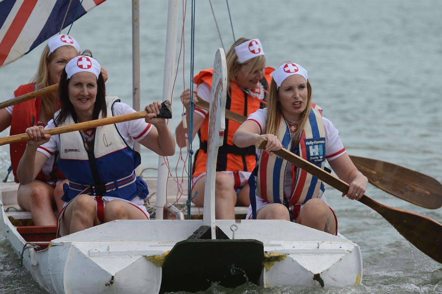 The Nautical Nurses team splash their way through the raft race