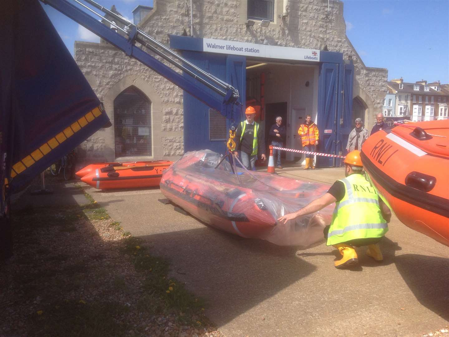 D Class inflatable vessell Duggie Rodbard II arrives at Walmer Lifeboat Station packed in plastic