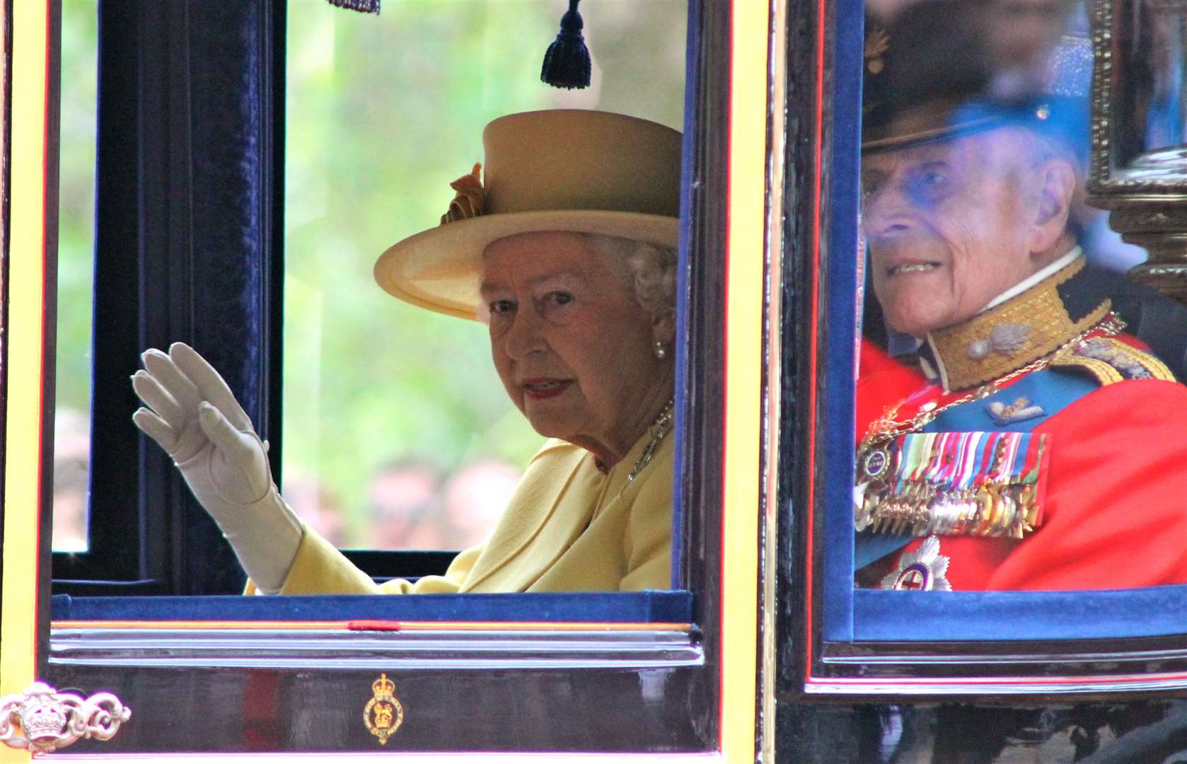 The Queen, with the Duke of Edinburgh in 2012, now travels in a carriage during the Trooping of the Colour