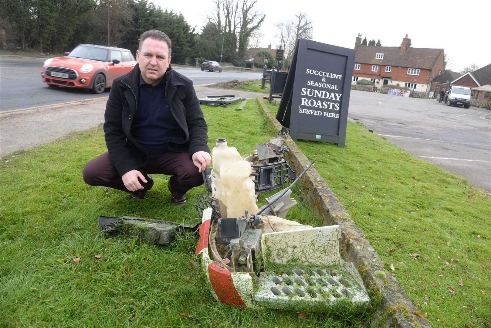 Danny Lucas with debris left from the recent accident