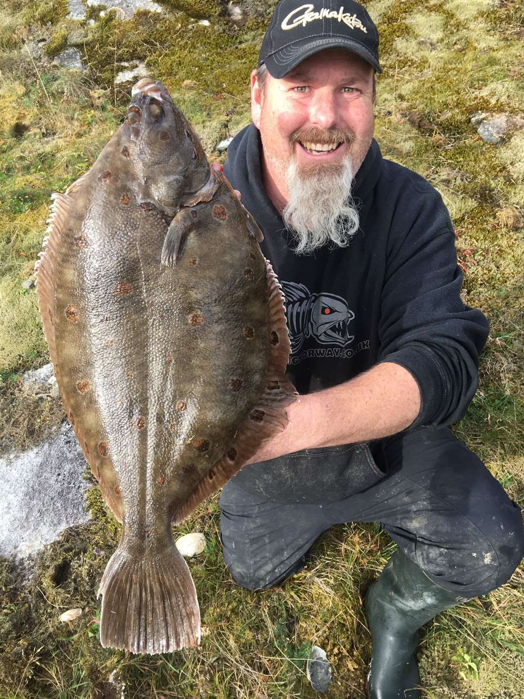 Boss of guided tours Phil Hambrook shows with this potential shore record 8lb13oz plaice (42671590)