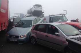 Cars piled up on each other in the fog on the Sheppey Crossing. Picture: Martin Stammers
