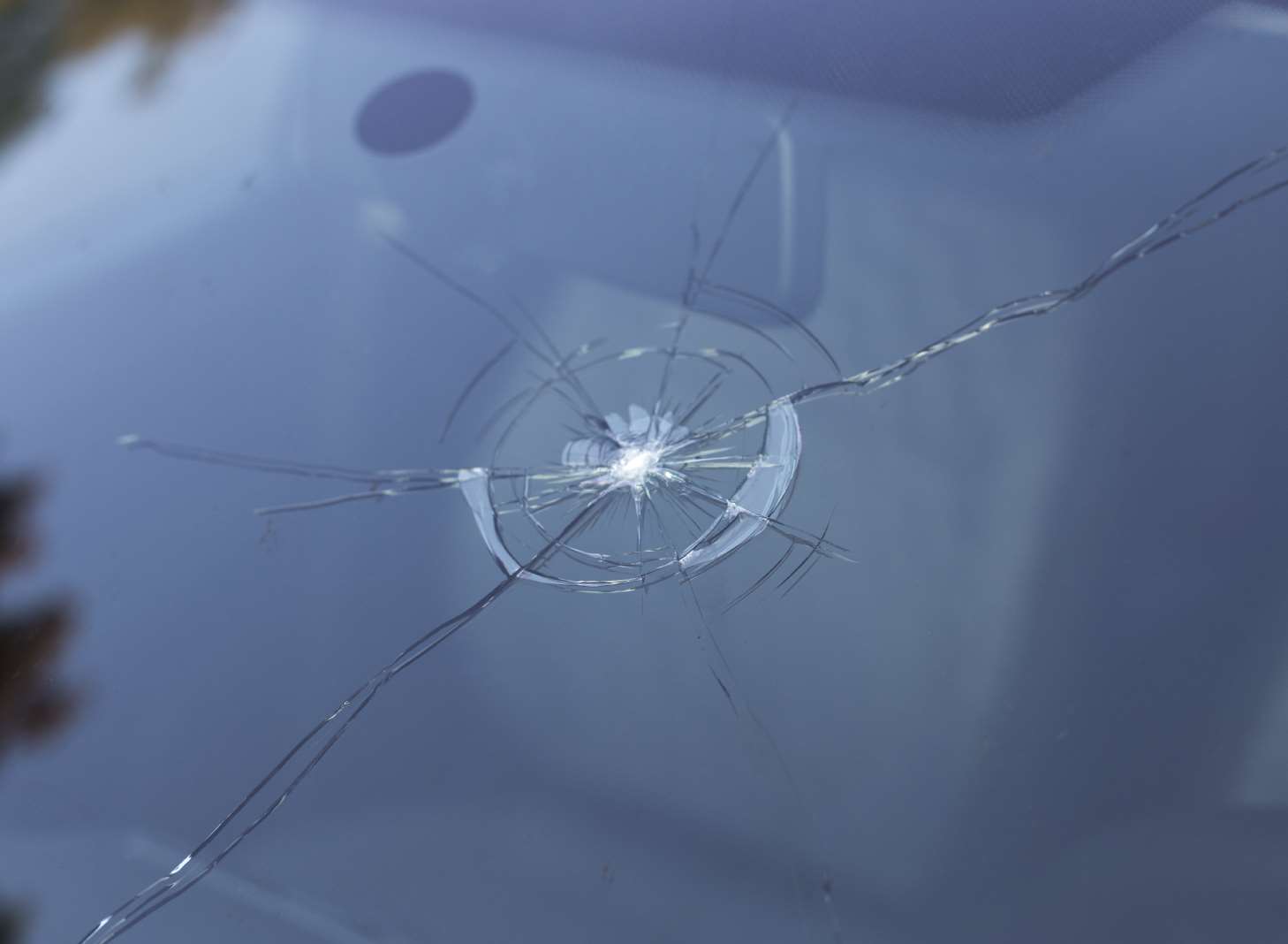 The windscreen was broken by a rock. Stock image.