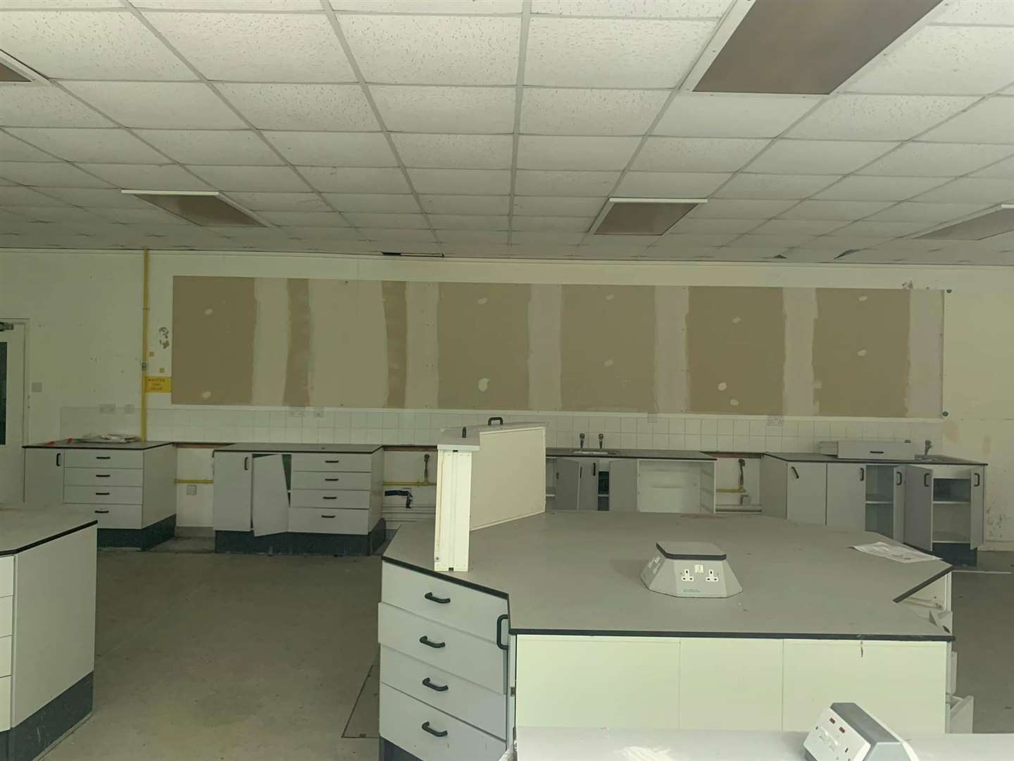 Displays have been stripped off the walls which are left bare