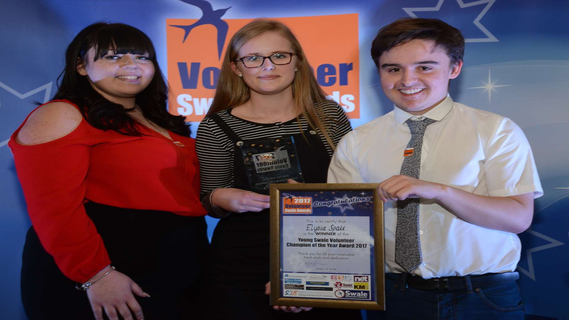 Demi Bailey and Patrick Cantellow presenting The Swale Young Volunteer Champion of the Year Award to Elysia Spall