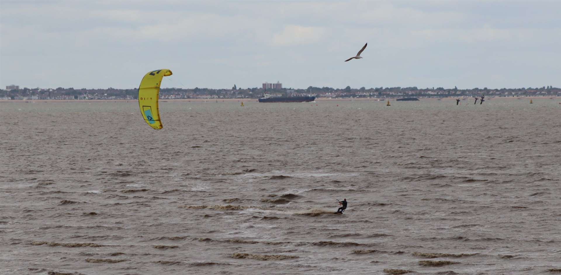 Kite surfers off the shingle bank at Minster on the Isle of Sheppey after coronavirus lockdown restrictions were eased