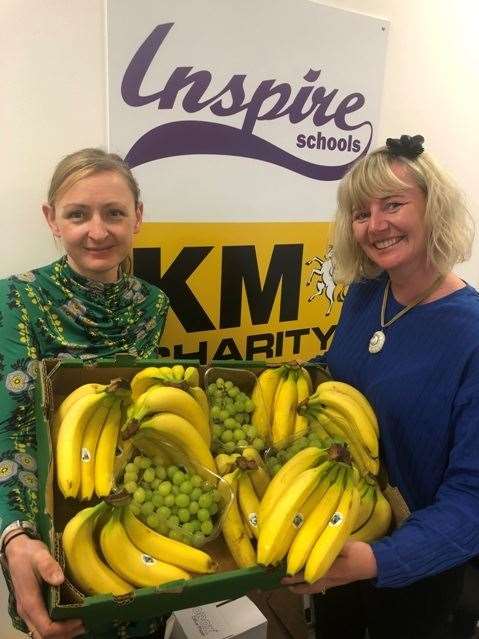 KM Big Bike Ride coordinator Hannah Hawksworth and KM Charity Team team manager Karen Brinkman with fruit left over from the event and donated to Changing Lives (9389391)