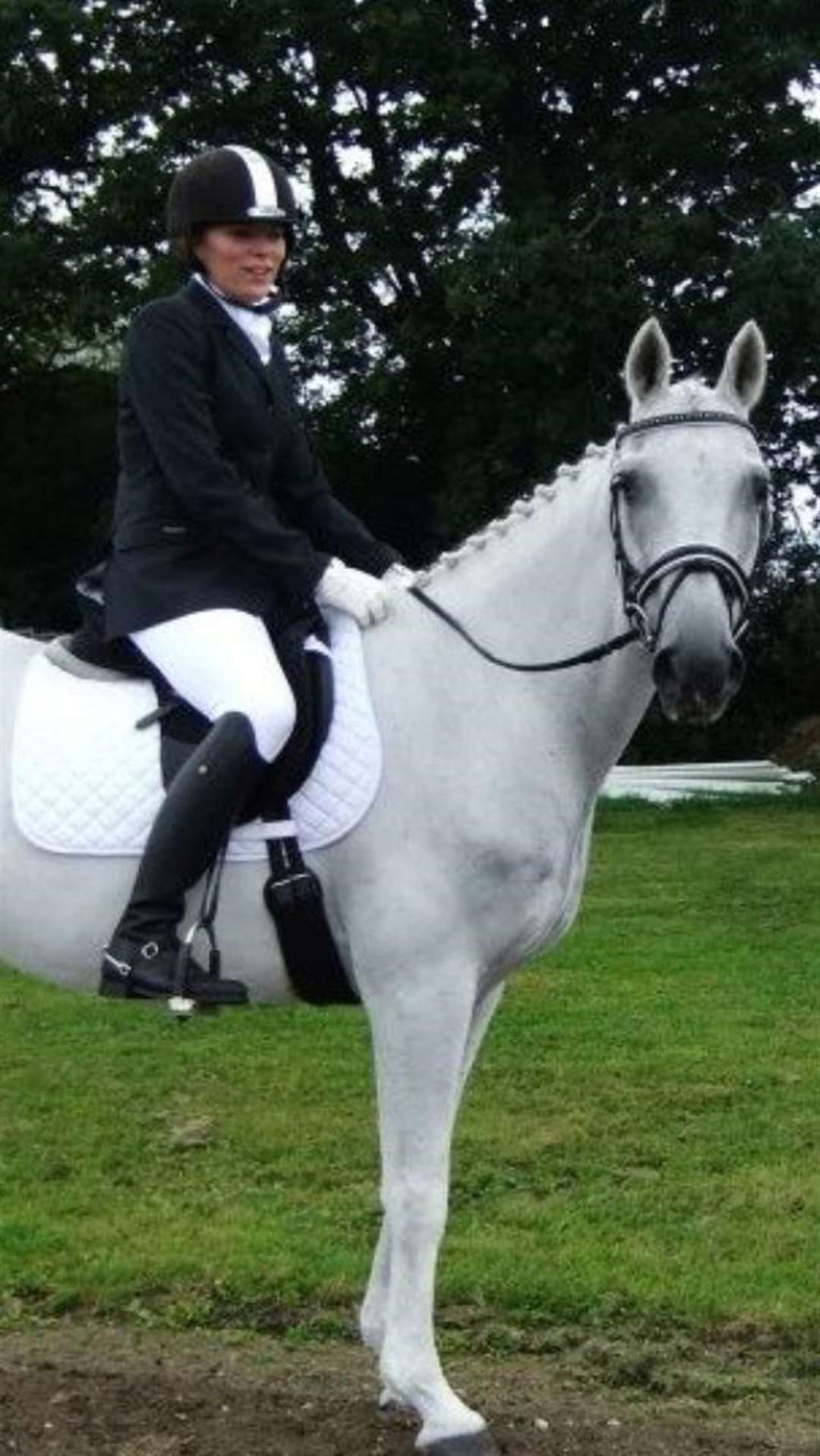 Natalie Louise Compson on Silver Fox at Hickstead in 2012