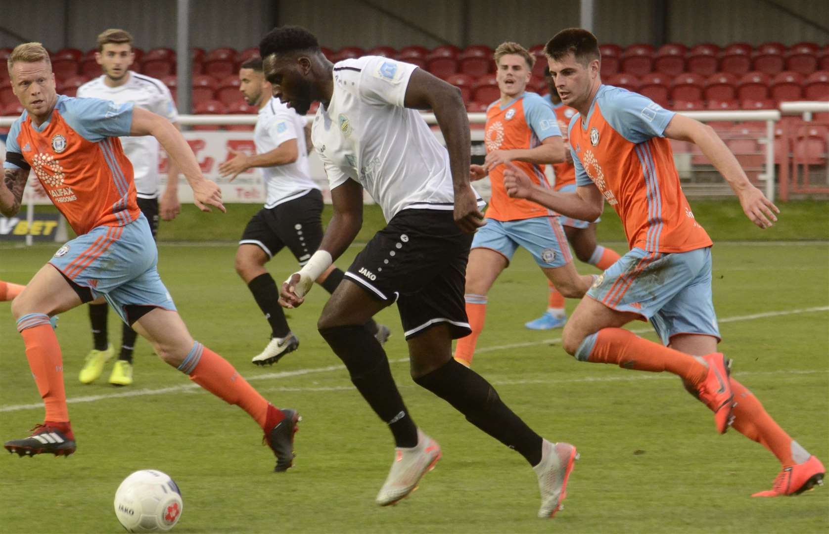 Dover striker Inih Effiong bursts forward against FC Halifax on Saturday Picture: Chris Davey