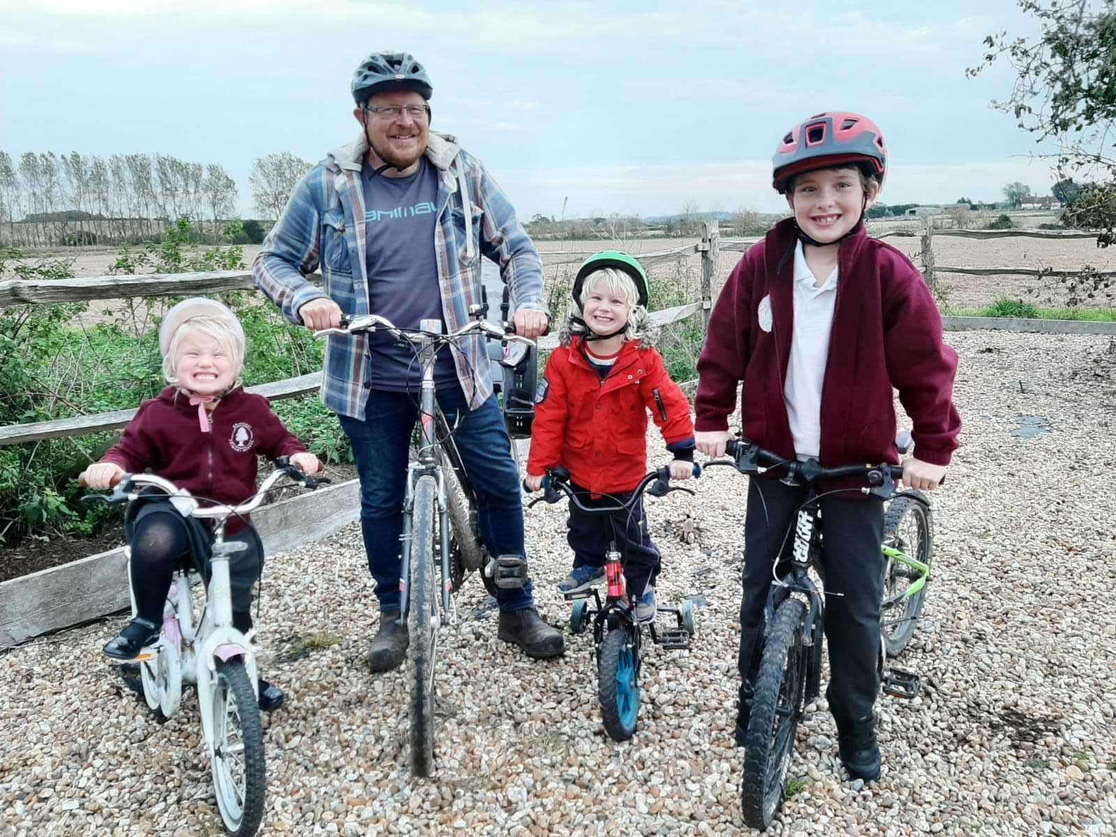 Cleve Hill cycleway campaigner Brian Jefferys with his children Samson, Jessie and Joe. Picture: Brian Jefferys