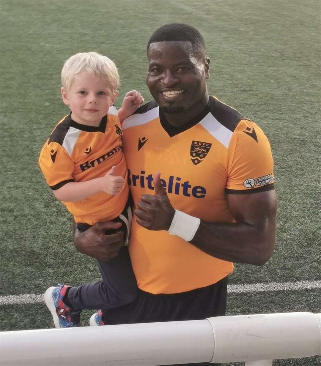 George Elokobi with young fan Leon Picture: Twitter/@Vikki15x