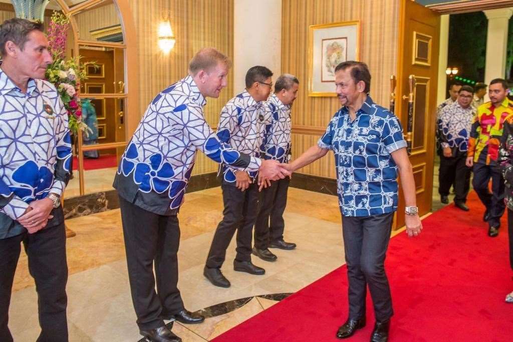 Ady Pennock meets the Sultan of Brunei, Hassanal Bolkiah, after leading DPMM to the Singapore Premier League title last year