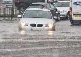 A car stranded at the bottom of Millen Road where it joins Milton High Street, Sittingbourne. Picture: Adam Yates