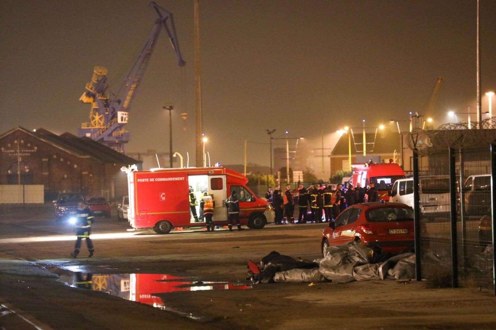Emergency services work to recover bodies of at least 27 people who drowned off Calais Picture: UKNIP