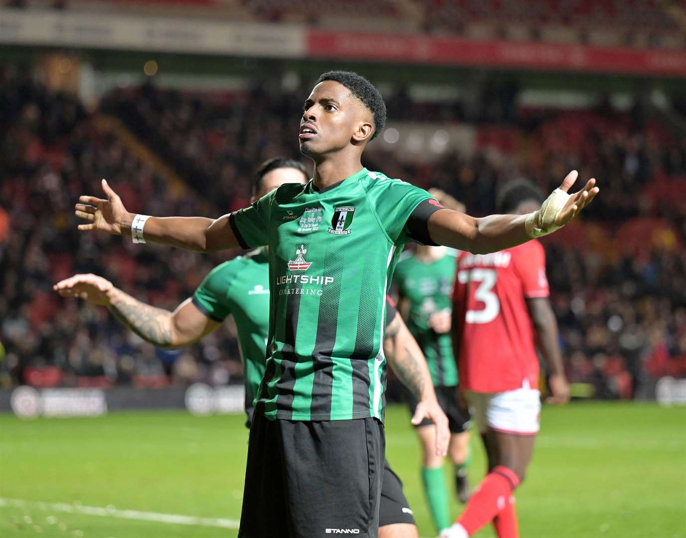 Kyrell Lisbie celebrates Cray Valley’s equaliser in front of 2,000 away fans. Picture: Keith Gillard