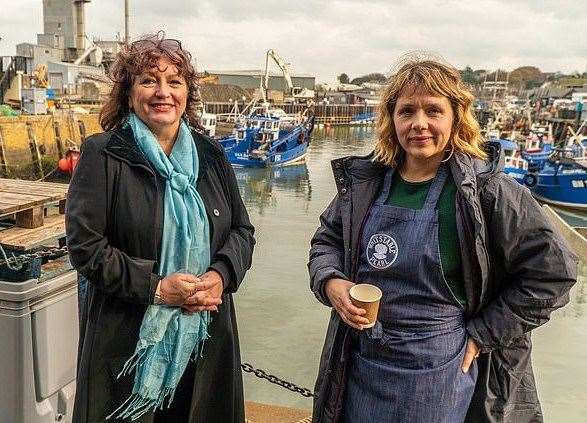 Julie Wasser (left) uses 'DFL' in her writing. Pictured here with actress Kerry Godliman at Whitstable Harbour. Picture: Mark Bourdillon Acorn TV