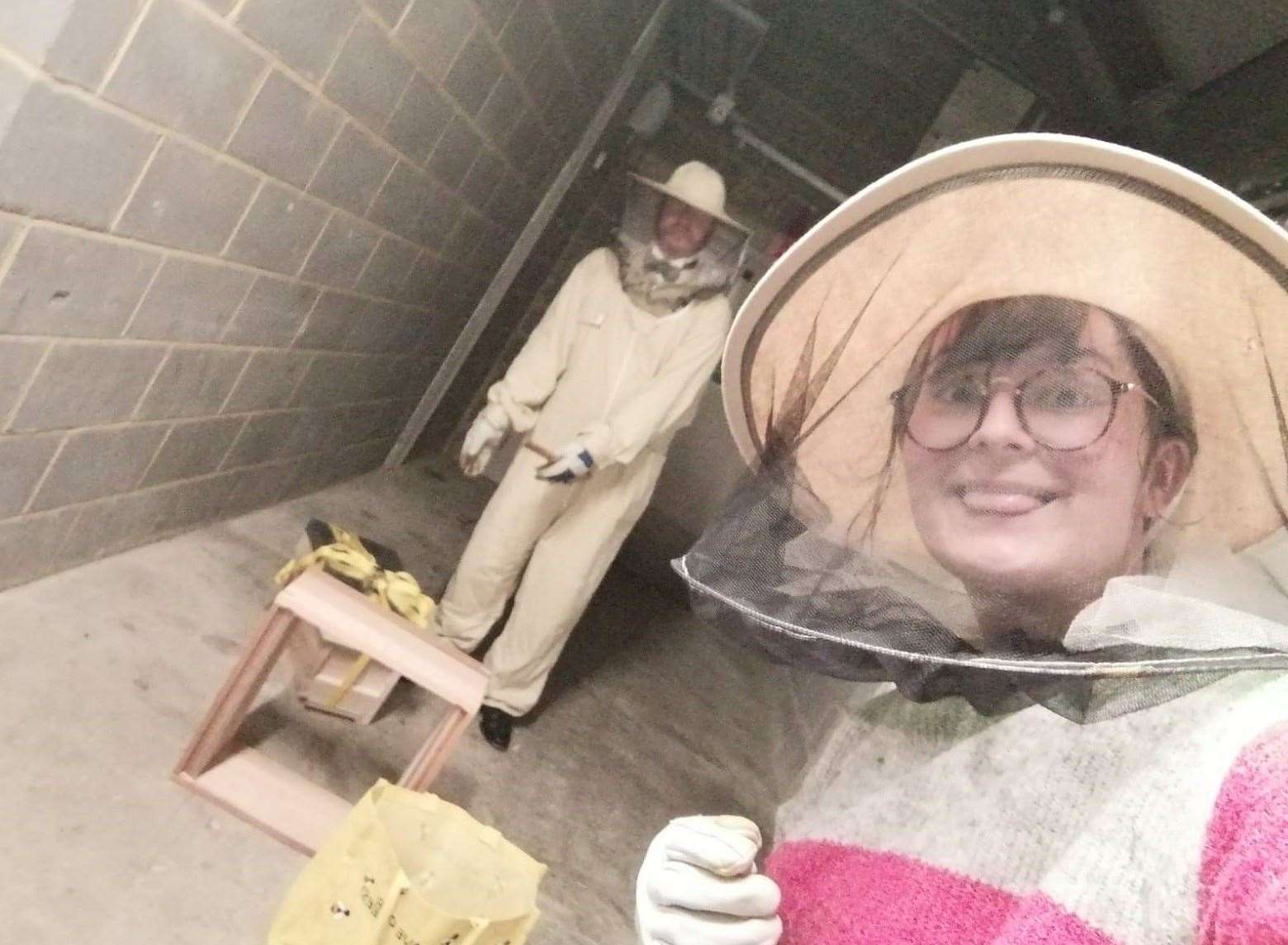 Beekeepers Stephanie Kalaichakis (front) and William Lay rehouse two swarms at Fremlin Walk shopping centre in Maidstone