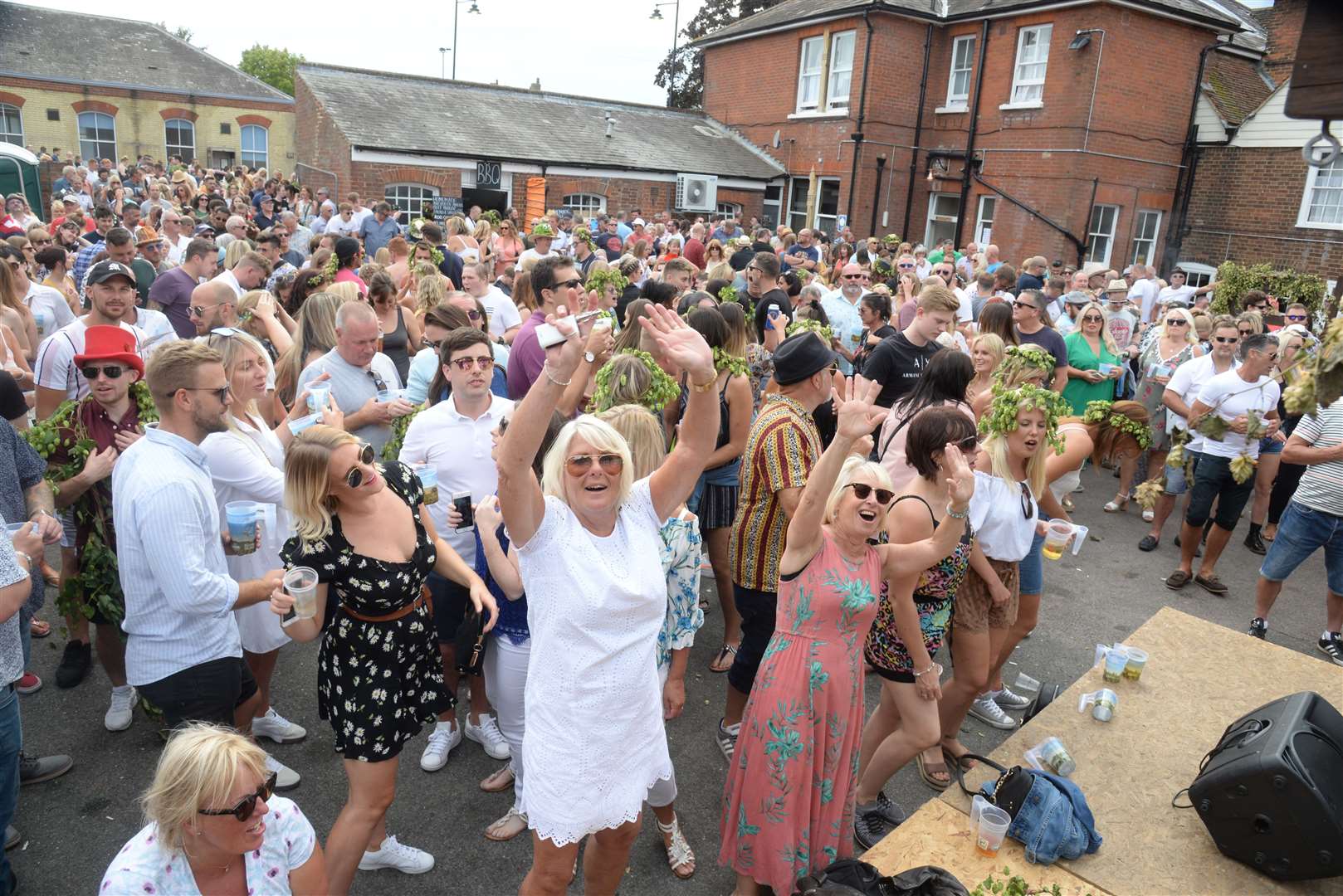 The packed courtyard as Tundra perform at The Railway Hotel during the 2019 Faversham Hop Festival