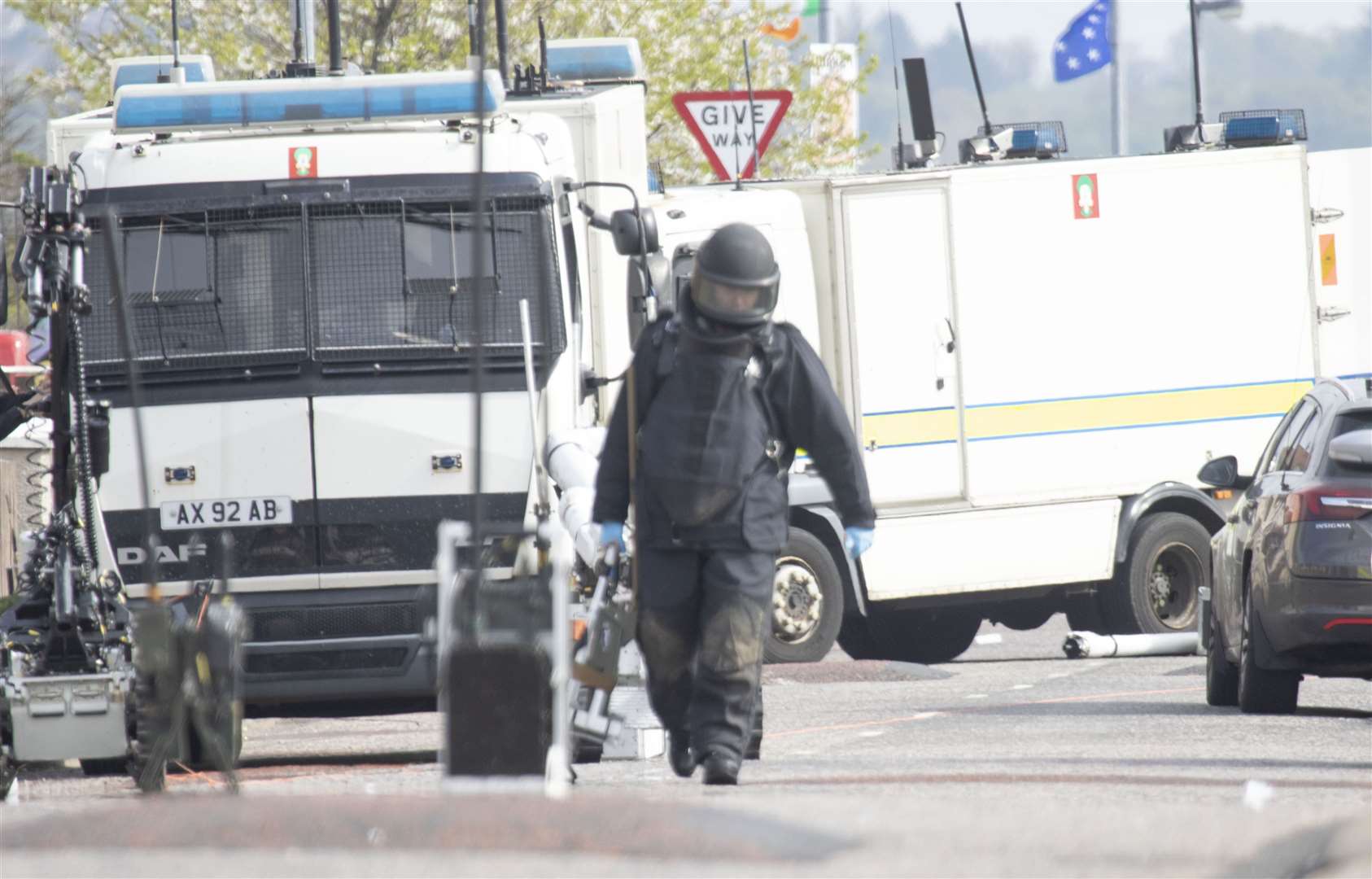 Ammunition technical officers (ATOs) attend a security alert at Iniscarn Road in Londonderry where a suspect device was found at the home of independent councillor Gary Donnelly. (Joe Boland/PA)