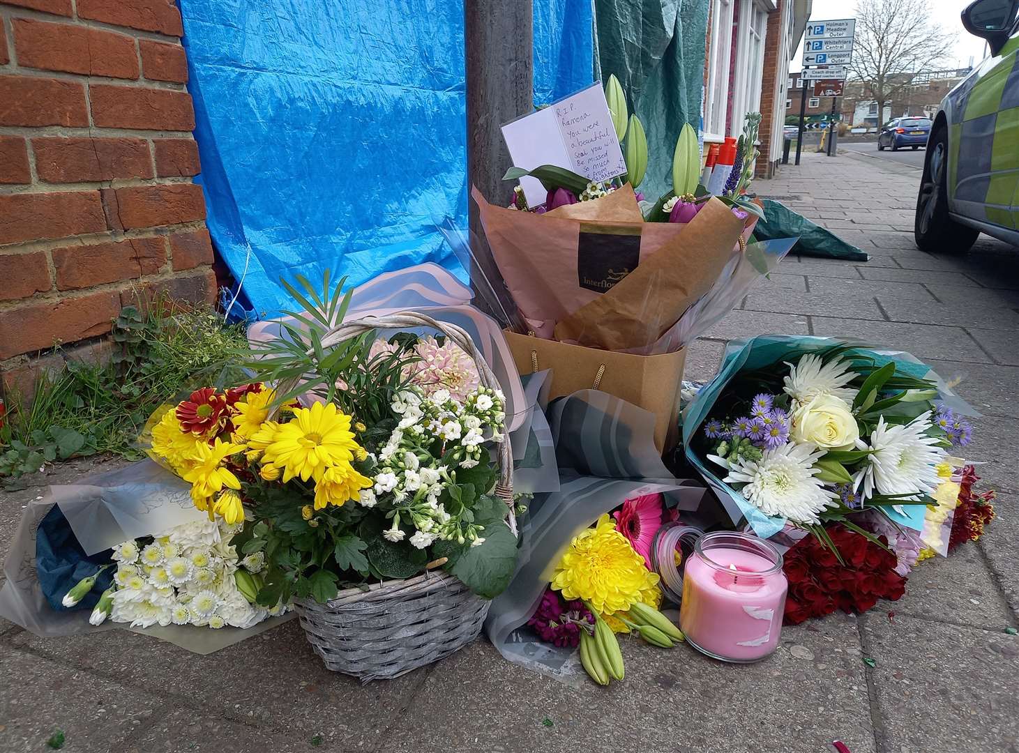 Floral tributes have been placed outside GothInk Studio