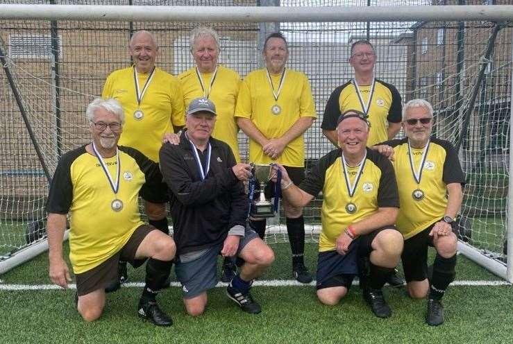 Kent FA over-60s’ Walking Football Cup winners Ramsgate FC get their hands on the trophy