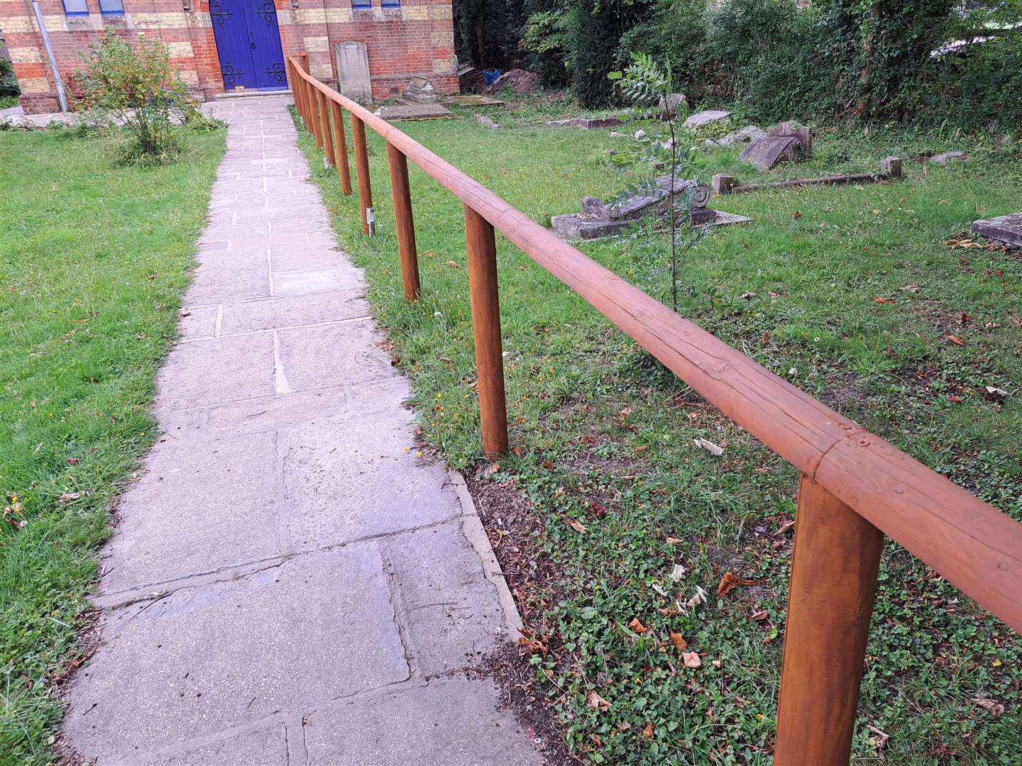 A new handrail guides visitors to the building