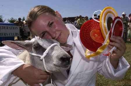 Heather Cooper, of Angley school young farmers with her supreme champion, blue cross romney sheep, Arwin