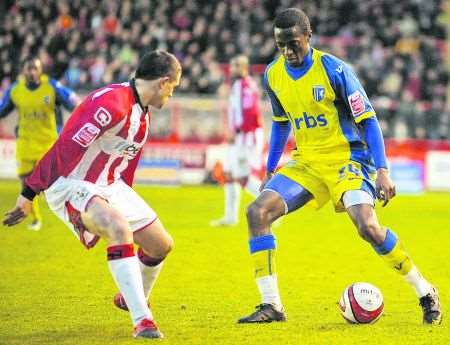 Gillingham's Rashid Yussuff in action during his full debut at Exeter