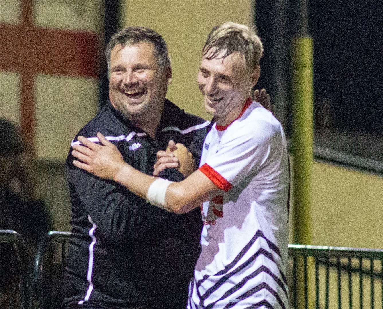 Deal manager Steve King celebrates with Ben Chapman as the Hoops make it three from three in the league this season. Picture: Paul Willmott