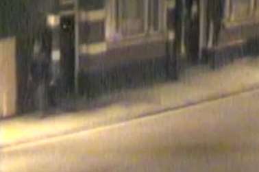 The arsonist runs away from the former Black Lion pub in Gillingham