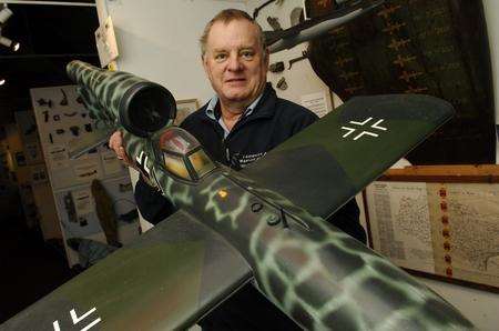 Curator Trevor Matthews with a model of the Fieseler Fi103 R-1V Reichenberg at Lashenden Air Warfare Museum