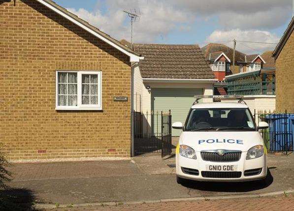 Police outside Michael Packman's home in Kemsley