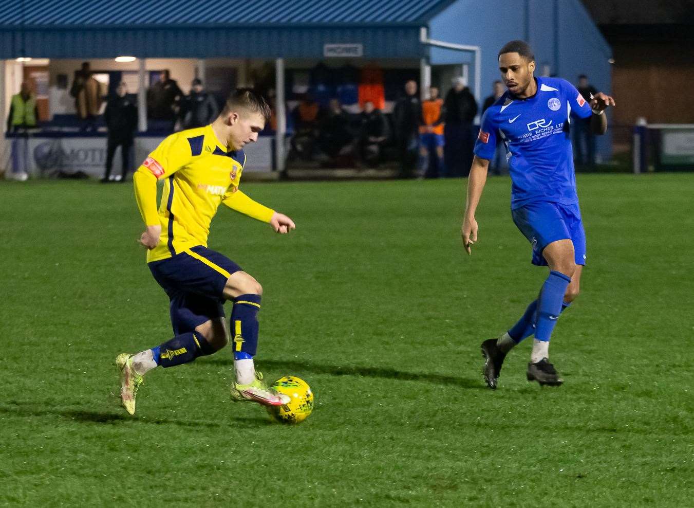 Herne Bay in action against Whitstable during their 2021/22 season at Winch's Field. Their pitch has been stripped out and work to install a 3G pitch is under way. Picture: Les Biggs