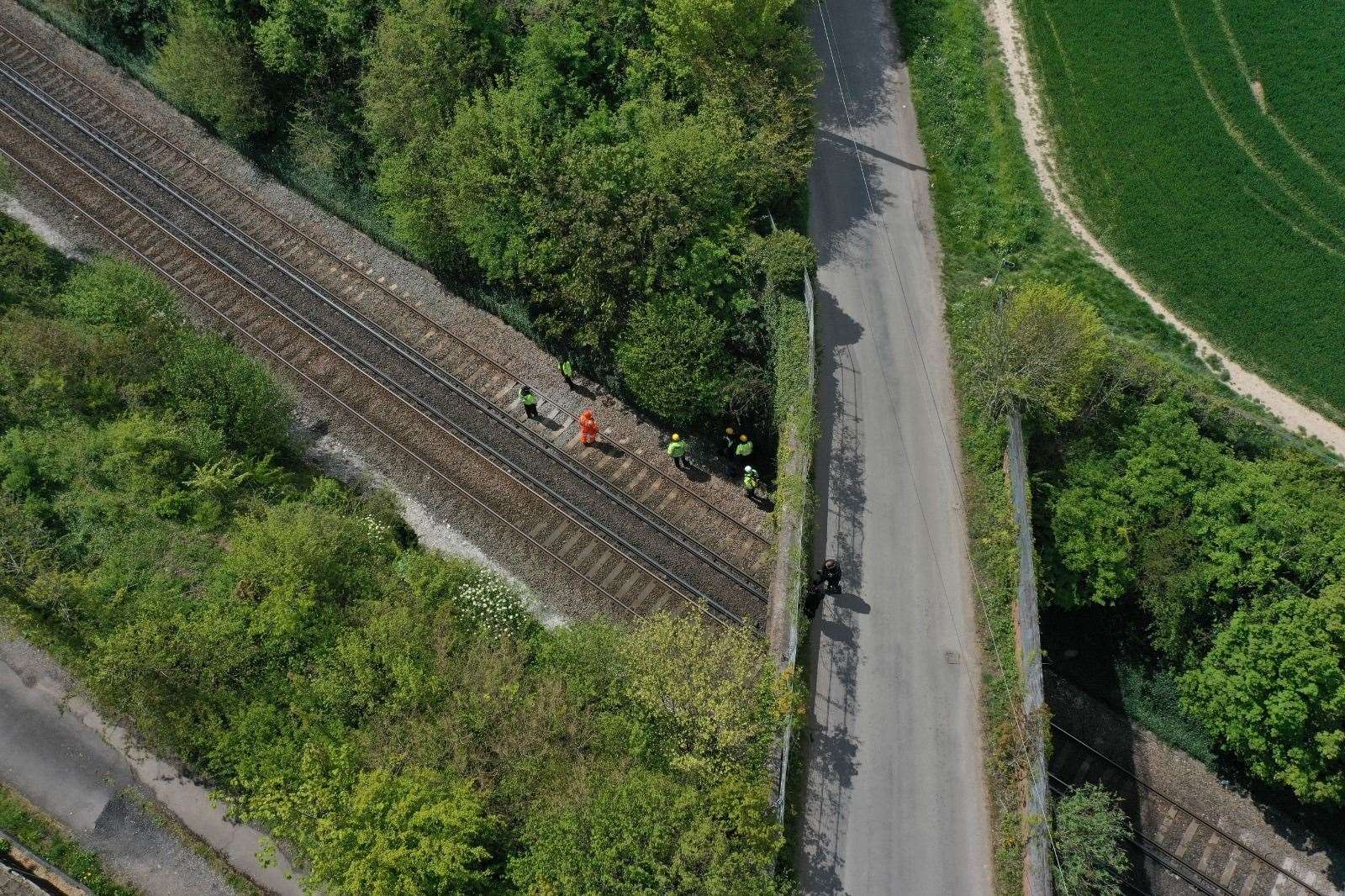 Police teams search railway tracks in Aylesham Picture: UKNIP