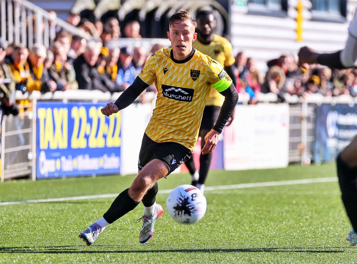 Sam Corne on the ball for Maidstone against Weston. Picture: Helen Cooper