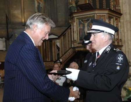 Edwin Boorman, the President of the Kent Messenger Group (left), receives his service medal from the new Commander of St John Ambulance Kent, John Hougham. Picture: DAVE DOWNEY