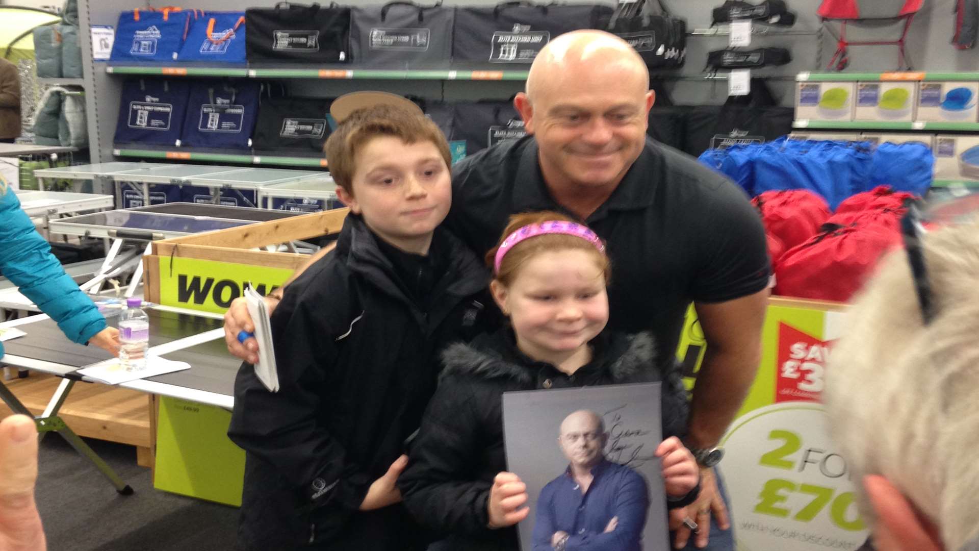 Ross meeting youngsters at the store