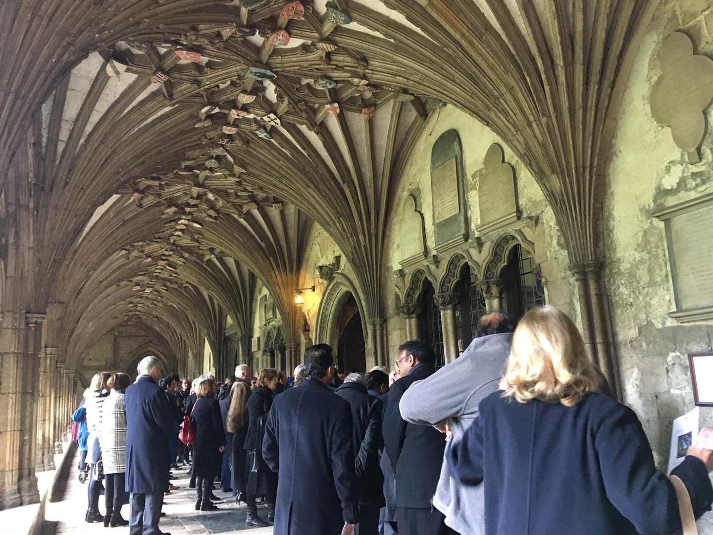 Crowds gather at Canterbury Cathedral following Dr Kanagasooriam's funeral.