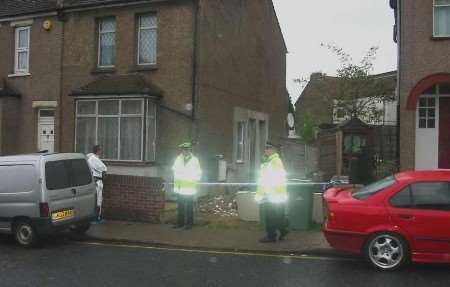 Police outside the property where the body was found. Picture: Sam Lennon